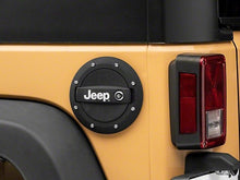Load image into Gallery viewer, Officially Licensed Jeep 07-18 Jeep Wrangler JK Locking Fuel Door w/ Printed Jeep Logo-Fuel Caps-Officially Licensed Jeep