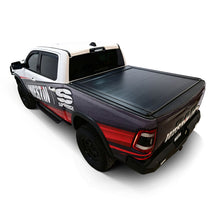 Load image into Gallery viewer, Westin manual retractable tonneau cover installed on a 2019-2026 Ram 1500 with 5-foot-7-inch bed