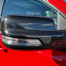 Load image into Gallery viewer, 2019+ RAM 1500/ TRX / RHO carbon fiber mirror cap covers — Exotic Innovations product image 2