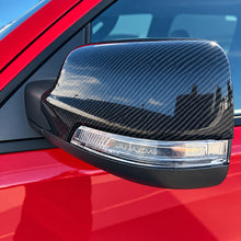 Load image into Gallery viewer, 2019+ RAM 1500/ TRX / RHO carbon fiber mirror cap covers — Exotic Innovations product image 6