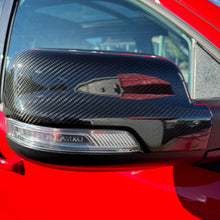 Load image into Gallery viewer, 2019+ RAM 1500/ TRX / RHO carbon fiber mirror cap covers Exotic Innovations