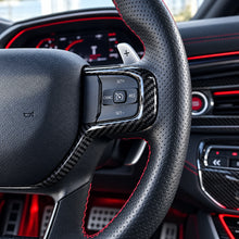 Load image into Gallery viewer, 2019+ RAM 1500/ TRX / RHO Carbon Fiber Steering Wheel Bezel Cover — Exotic Innovations product image 3