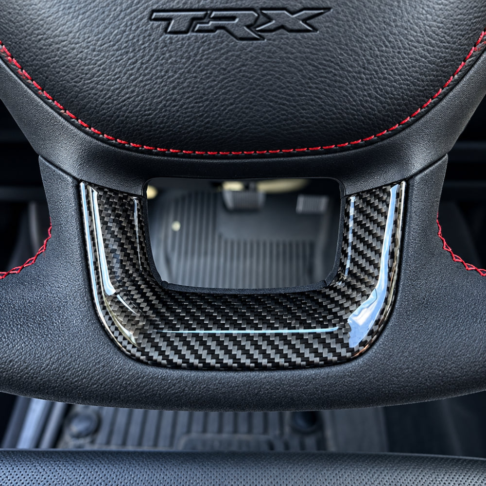 2019+ RAM 1500/ TRX / RHO carbon fiber steering wheel Lower Trim Cap — Exotic Innovations product image 4