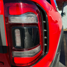 Load image into Gallery viewer, 2019+ RAM TRX / RHO Carbon Fiber Taillight Vent Covers! Exotic Innovations