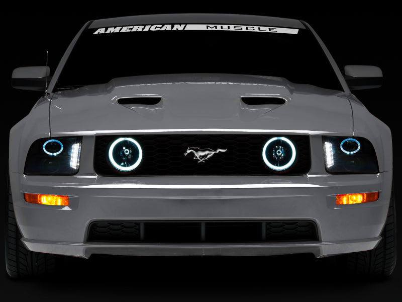 Raxiom 05-09 Ford Mustang w/ Halogen LED Halo Prjctr Headlights-Blk Hsng(Smoked Lens Exclude GT500)-Headlights-Raxiom