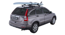 Load image into Gallery viewer, Close up Rhino-Rack padded cradle and locking strap system