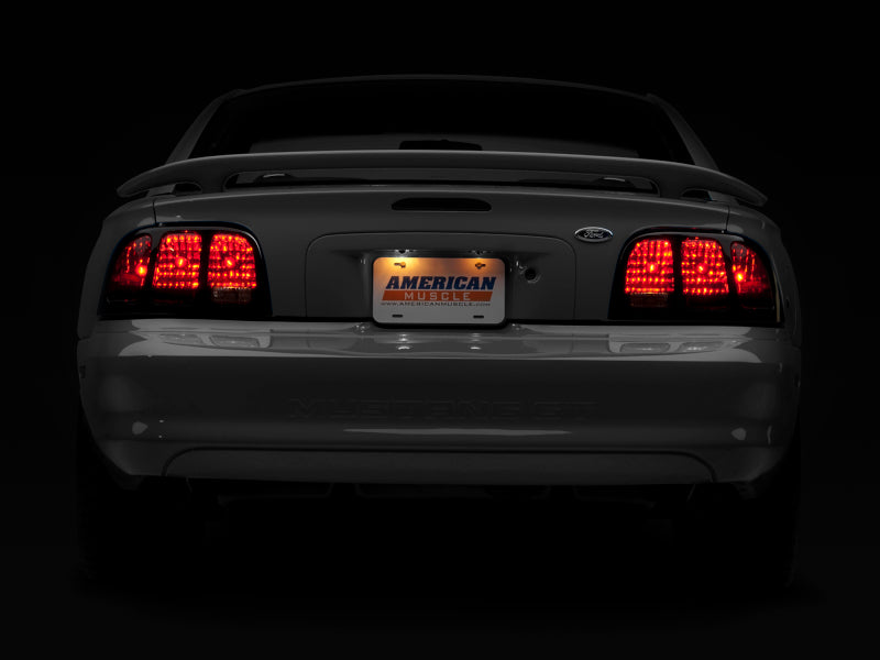 Raxiom 96-98 Ford Mustang Tail Lights- Black Housing (Smoked Lens)-Tail Lights-Raxiom