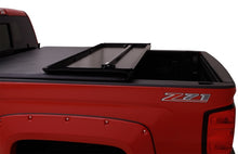 Load image into Gallery viewer, Lund 04-15 Nissan Titan (5.5ft. Bed) Hard Fold Tonneau Cover w/Bracket Kit - Black-Tonneau Covers - Hard Fold-LUND