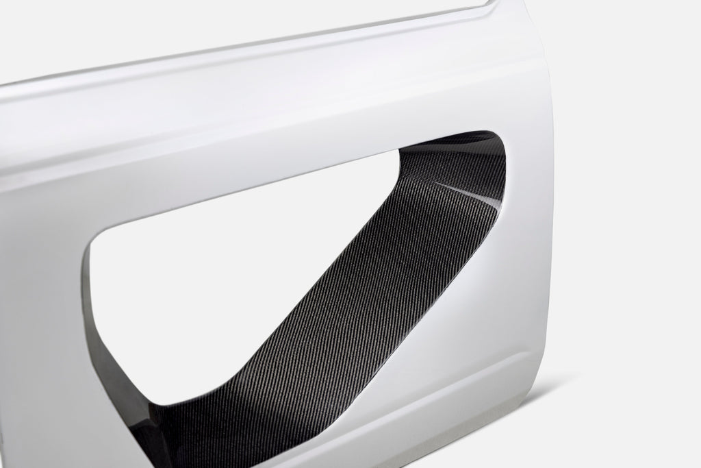 Detailed image of carbon fiber craftsmanship and reinforced hinge area