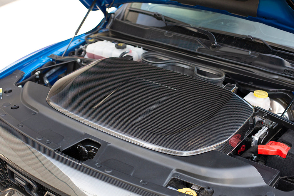 Top view of Anderson Composites Carbon Fiber Engine Cover highlighting weave pattern 