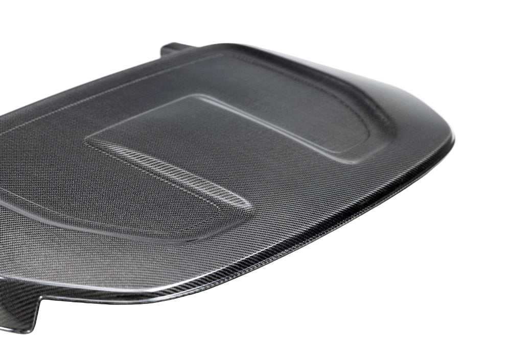 Engine bay photo showing installed carbon fiber cover