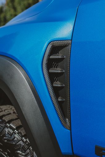 Pair of Anderson Composites Carbon Fiber Fender Vent Inserts displayed side by side