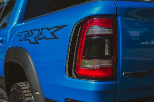 Anderson Composites 21-23 Dodge RAM TRX Taillight Surround SKU: AC-TLS21DGTRX
