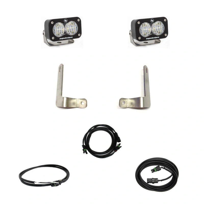 Baja Designs S2 dual reverse LED light kit designed for 2021+ RAM 1500 TRX. Includes two high-output LED pods, mounting brackets, and wiring for factory-style reverse lighting.