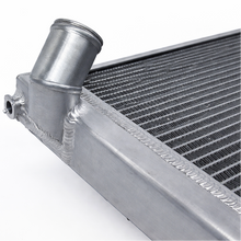 Load image into Gallery viewer, Close-up of CSF 7241 aluminum radiator angled filler neck and upper tank detail