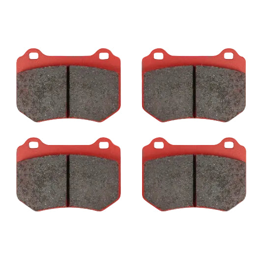 Set of red DBA RP Series rear brake pads for 2018-2021 Subaru WRX STI shown out of package