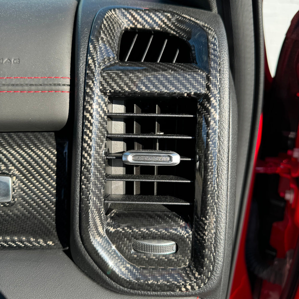 Carbon fiber vent cover installed on RAM interior