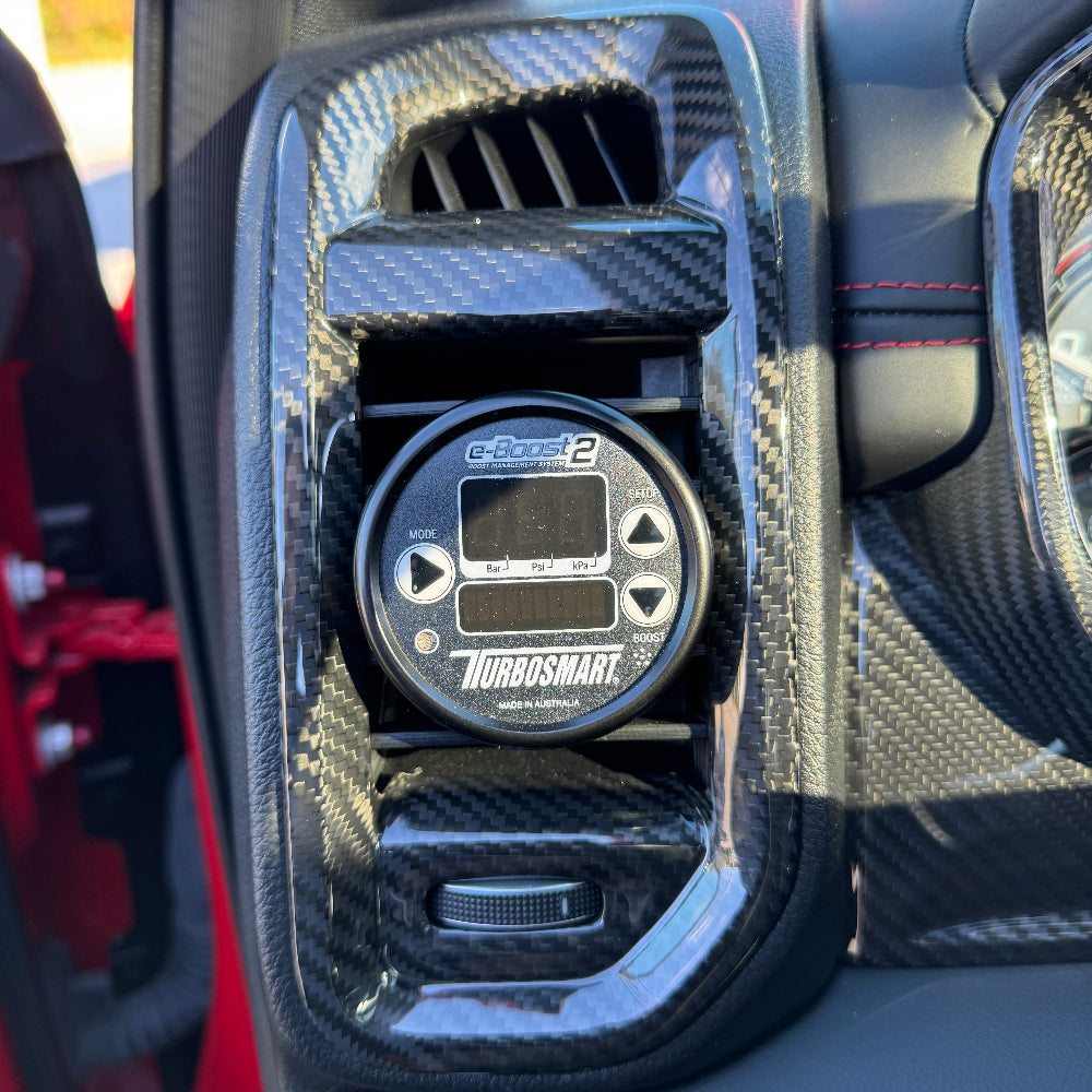 Close-up of 3K 2x2 twill carbon fiber weave and clear coat