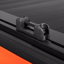 Load image into Gallery viewer, RealTruck Elevate tie downs installed on Elevate rack system for secure cargo mounting