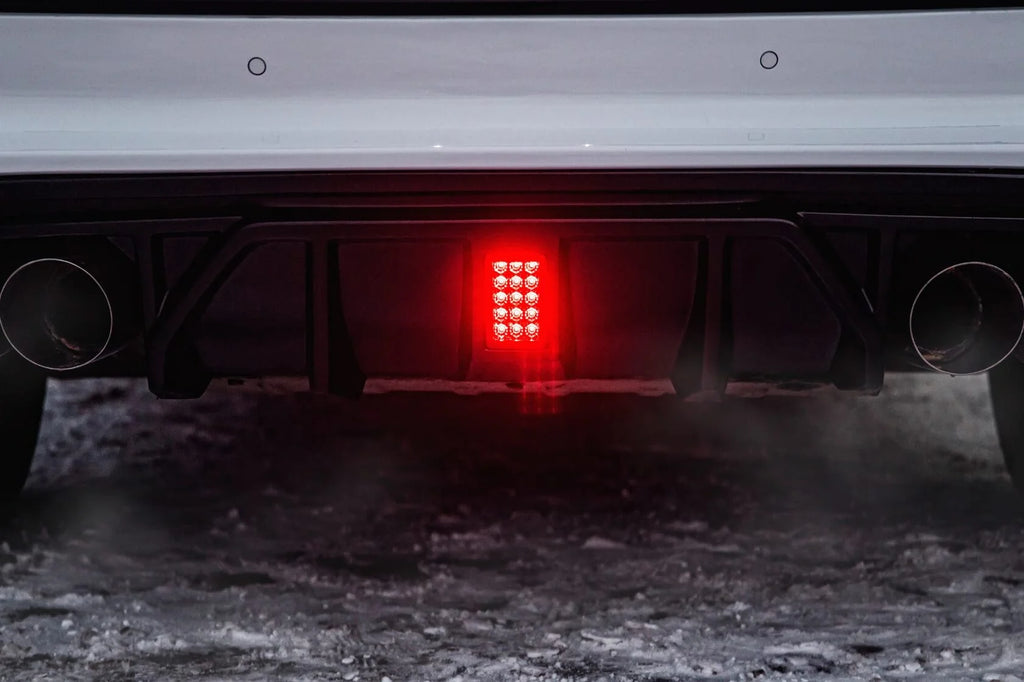 Diffuser fins and LED light detail showing aerodynamic contour.