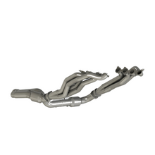 Load image into Gallery viewer, Photo showing an unmounted stainless steel exhaust header assembly with catalytic converter for a vehicle.