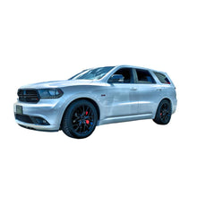 Load image into Gallery viewer, Two coiled Swift Spec-R lowering springs in black, designed for Dodge Durango SRT and Hellcat models, emphasizing track-ready performance.