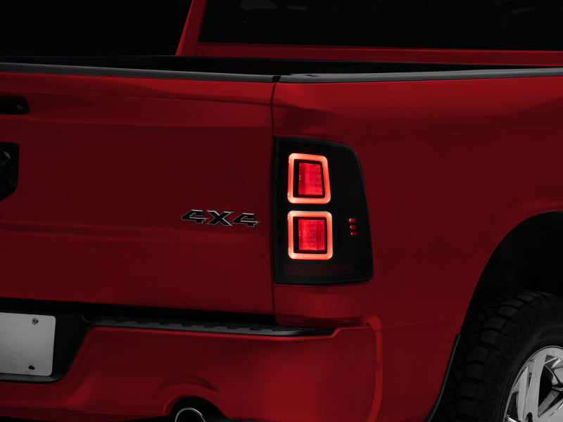 RAXR110172-Raxiom 09-18 Dodge RAM 1500 LED Tail Lights- Black Housing (Smoked Lens)-Tail Lights-Raxiom