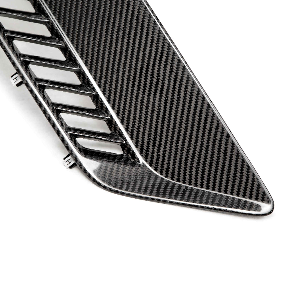 Close-up highlighting vent structure and glossy finish