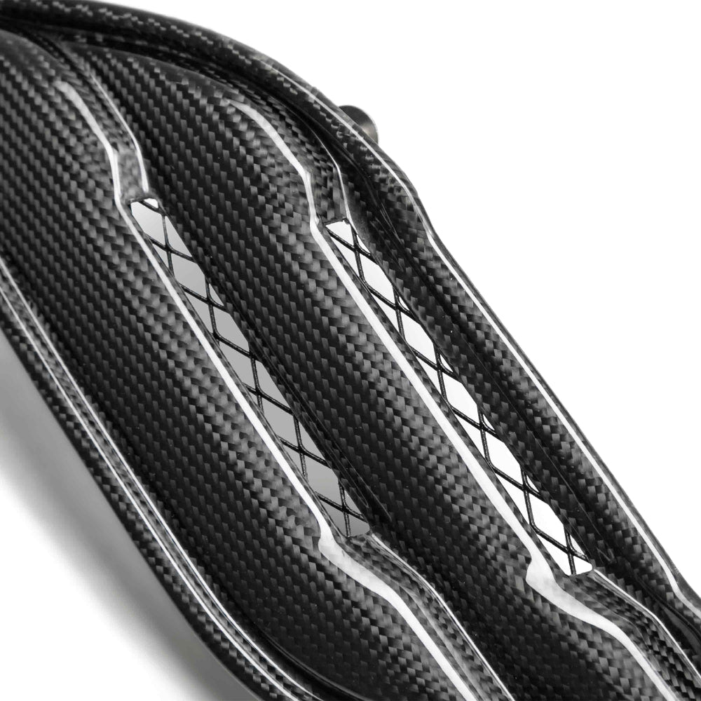 Close-up view showing OEM fitment and carbon fiber texture