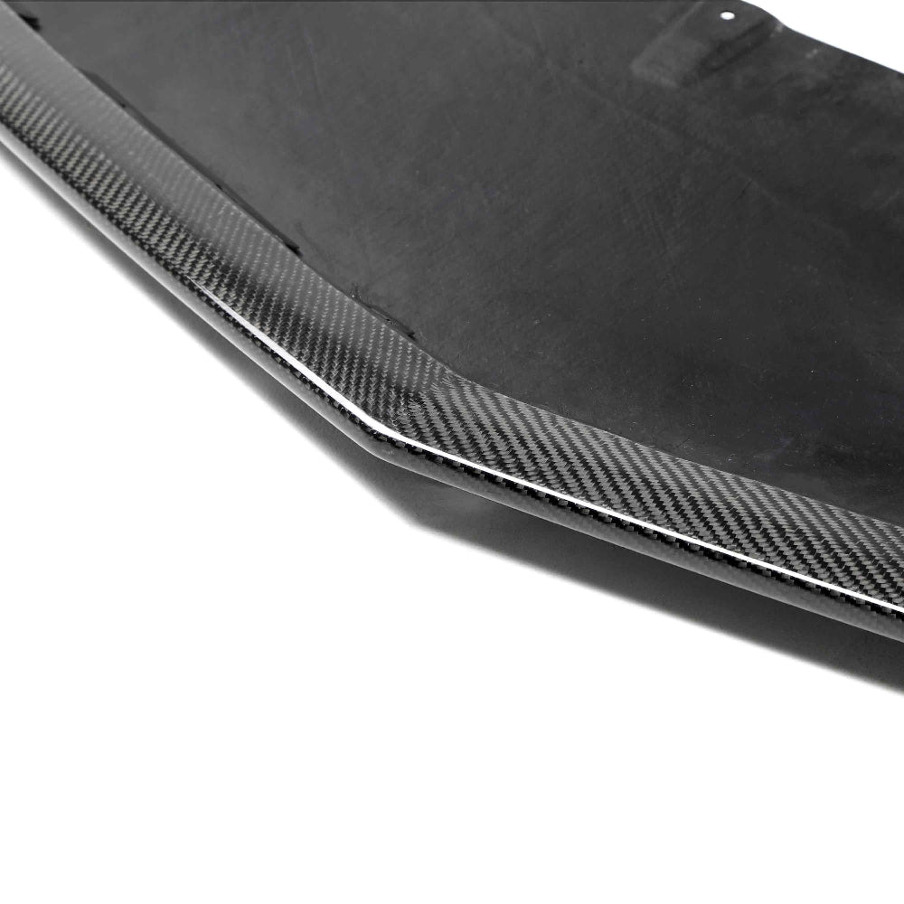 Close-up of carbon fiber weave and high-gloss UV-protected finish