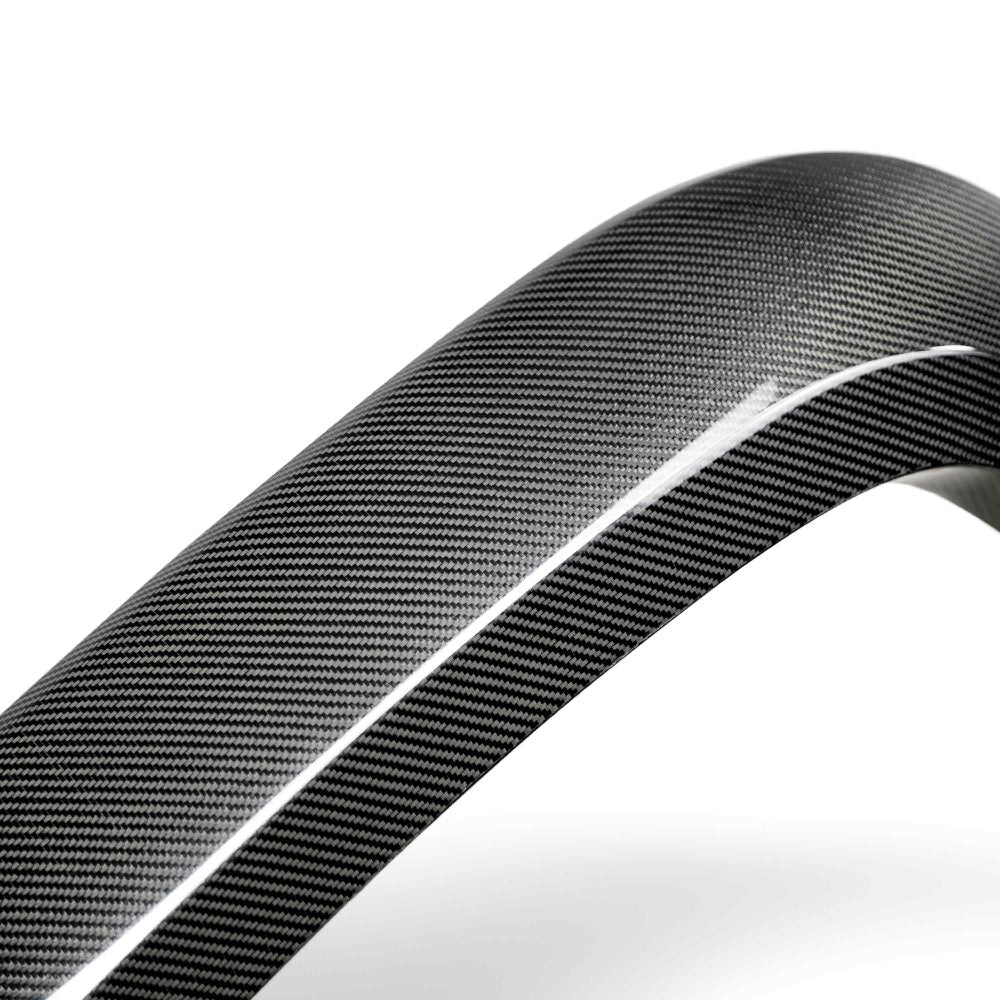 Close-up showing 3K 2x2 twill carbon fiber weave and glossy UV finish