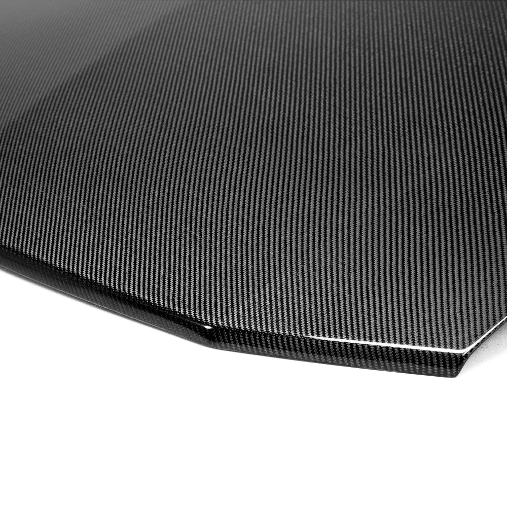 Close-up of carbon fiber weave and factory-style contours