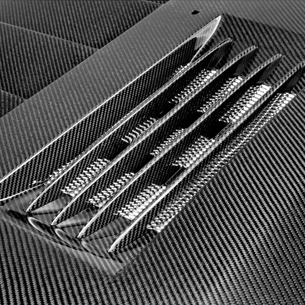 Top view showing gloss carbon finish and vent detail