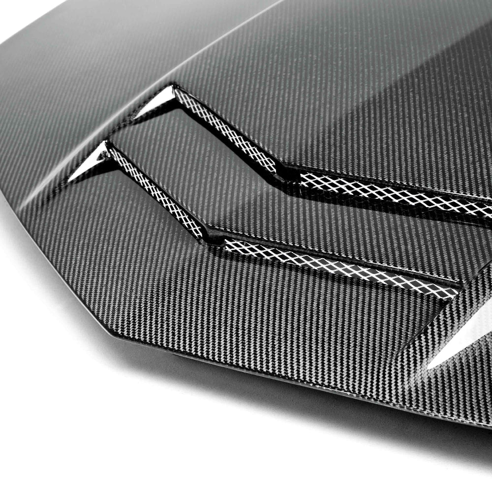 Side profile emphasizing aggressive hood lines and precise fitment