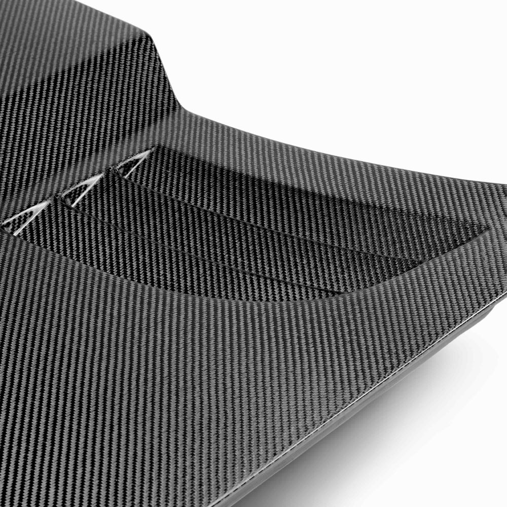 Close-up of 3K 2x2 twill carbon fiber pattern with deep gloss finish