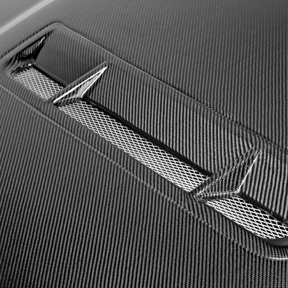 Close-up of 3K 2x2 twill carbon fiber weave texture and UV-clear coat sheen