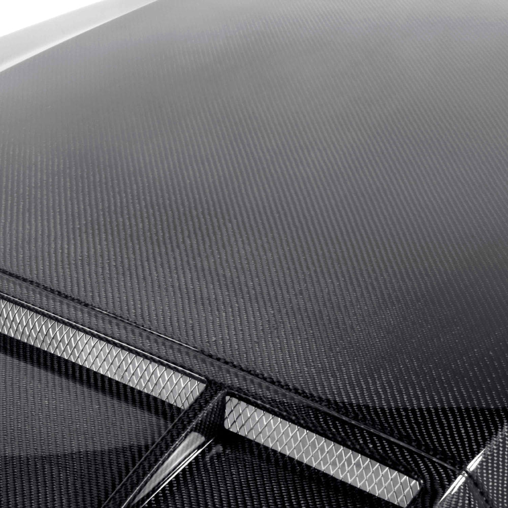 Top view showing integrated ram-air duct openings and carbon fiber finish