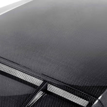 Load image into Gallery viewer, Top view showing integrated ram-air duct openings and carbon fiber finish