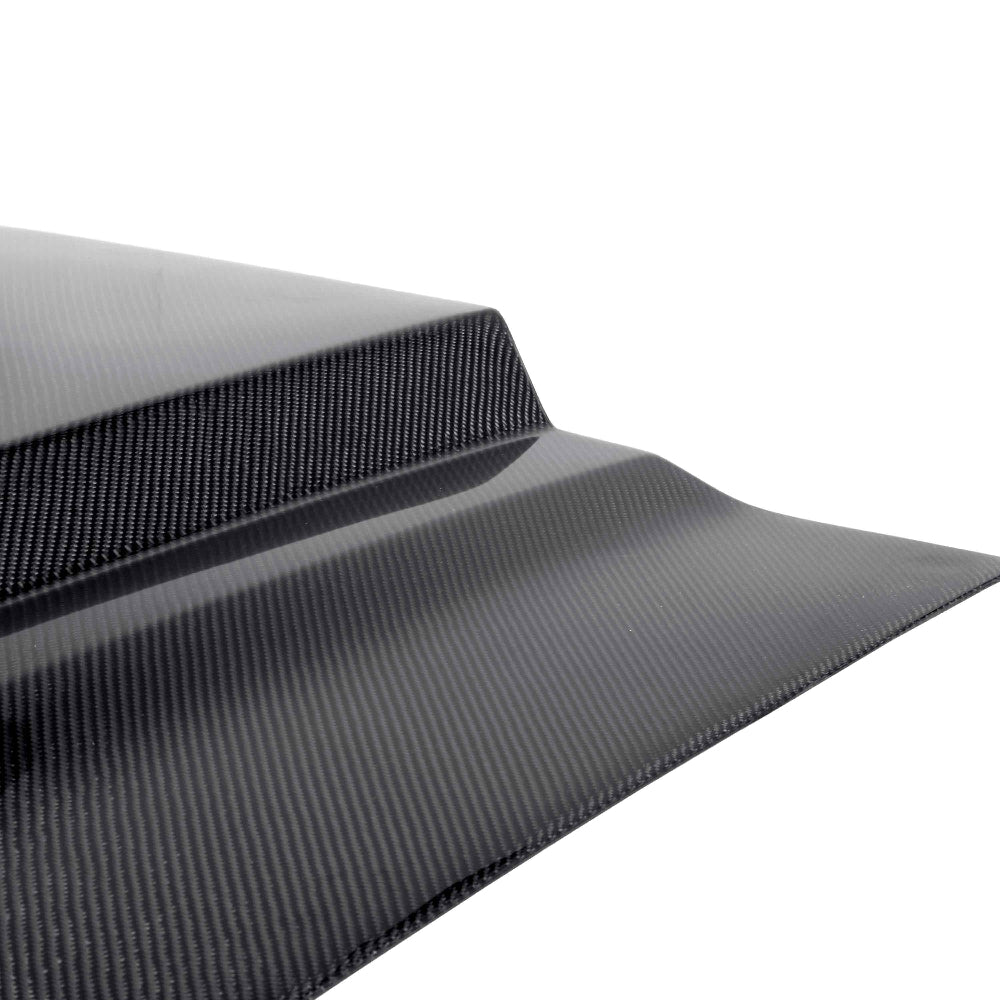 Side profile highlighting vent layout and aggressive contour lines