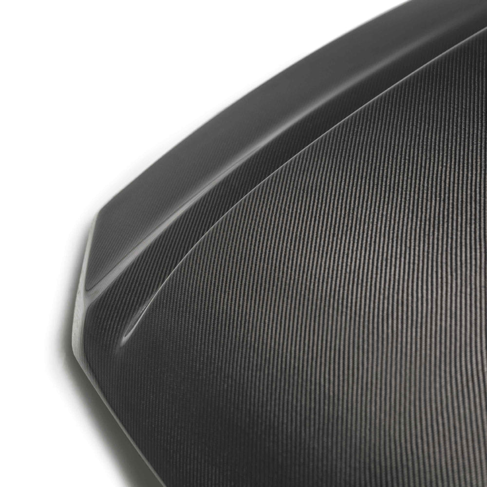 Side profile showing hood height and sleek fitment along fenders