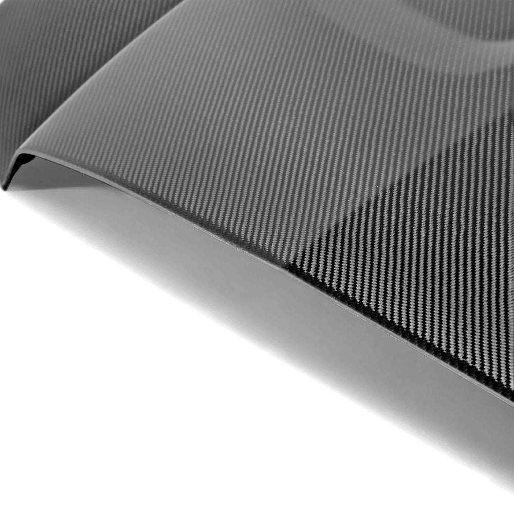 Rear view detailing hood curvature near windshield and clean finish