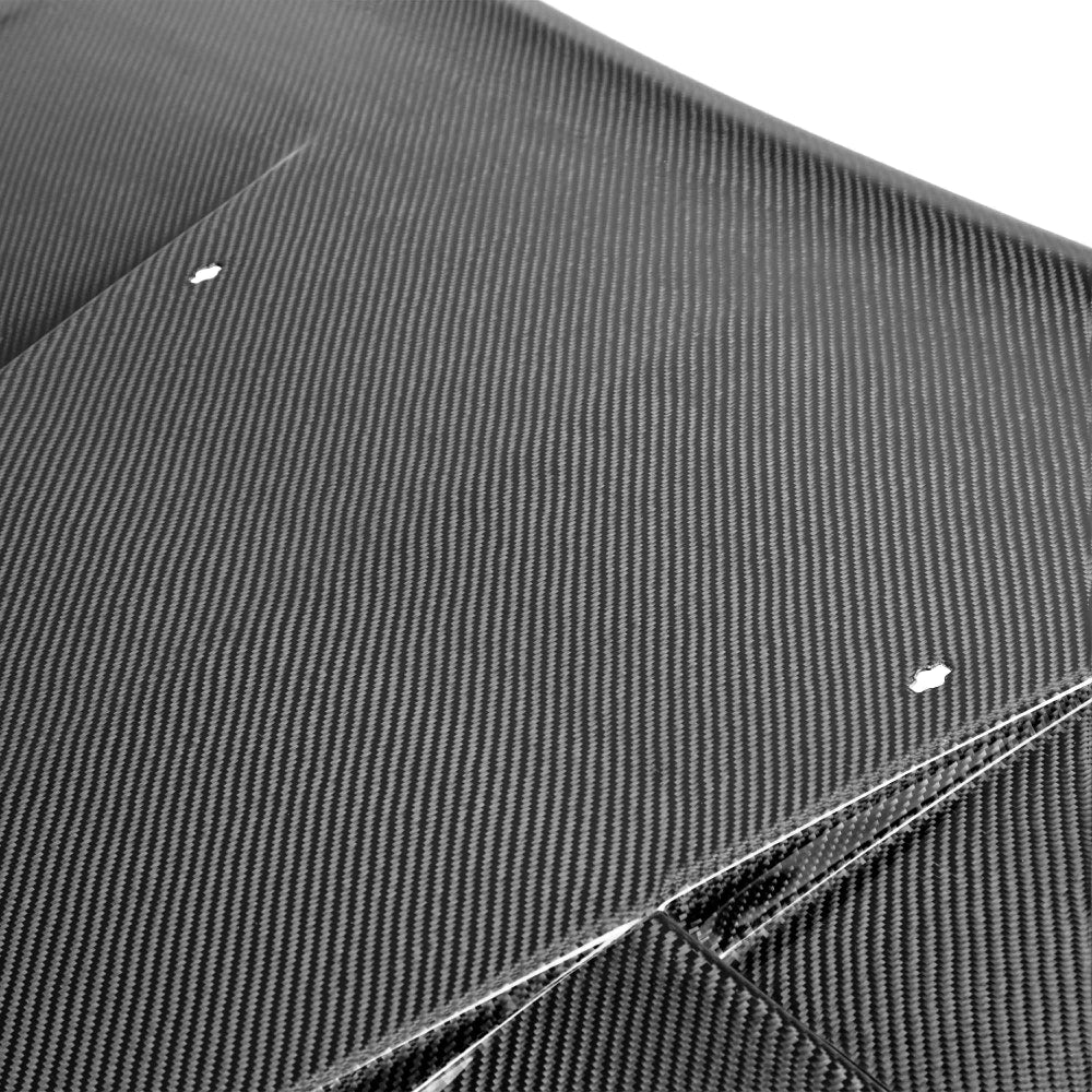Top view highlighting vent layout and carbon fiber weave pattern