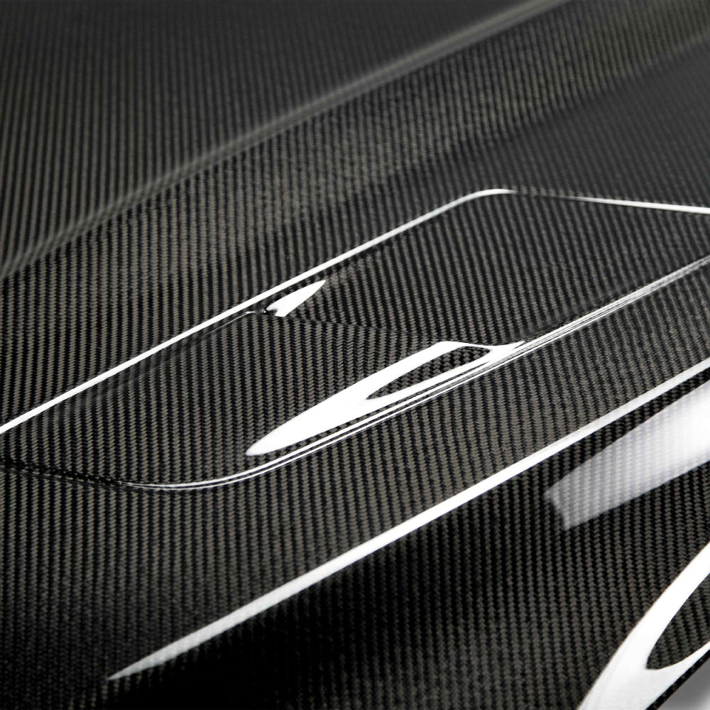 Close-up of 3K 2x2 twill carbon fiber weave on Anderson Composites Type-OE Hood