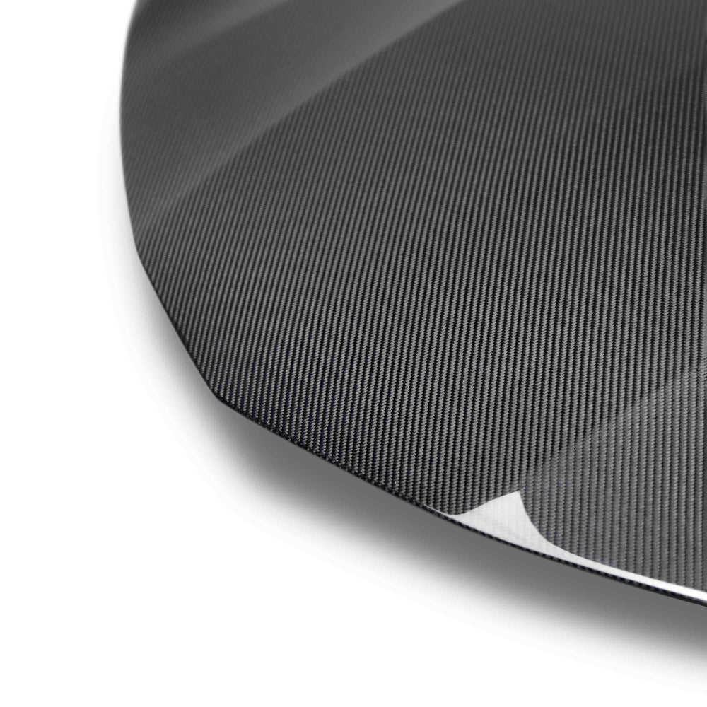 Side profile highlighting smooth contours and lightweight carbon construction.