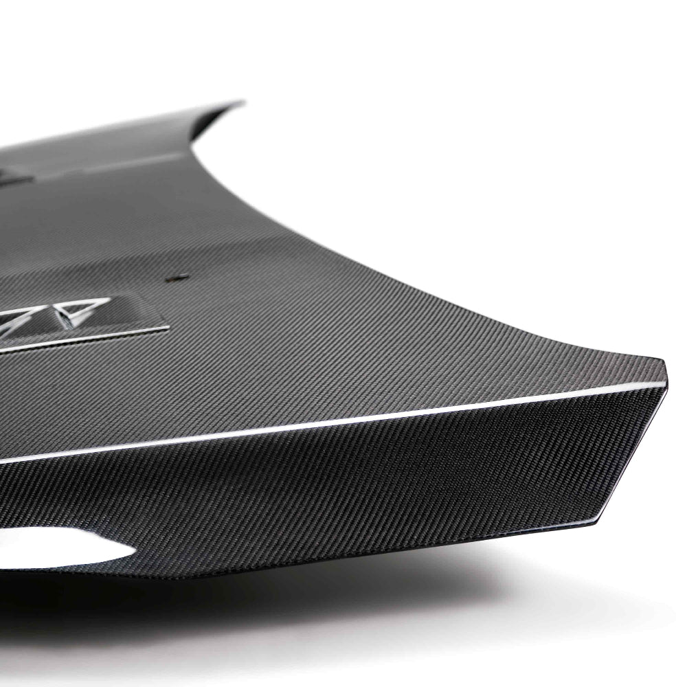 Close-up of 3K twill weave and polished UV-resistant surface.