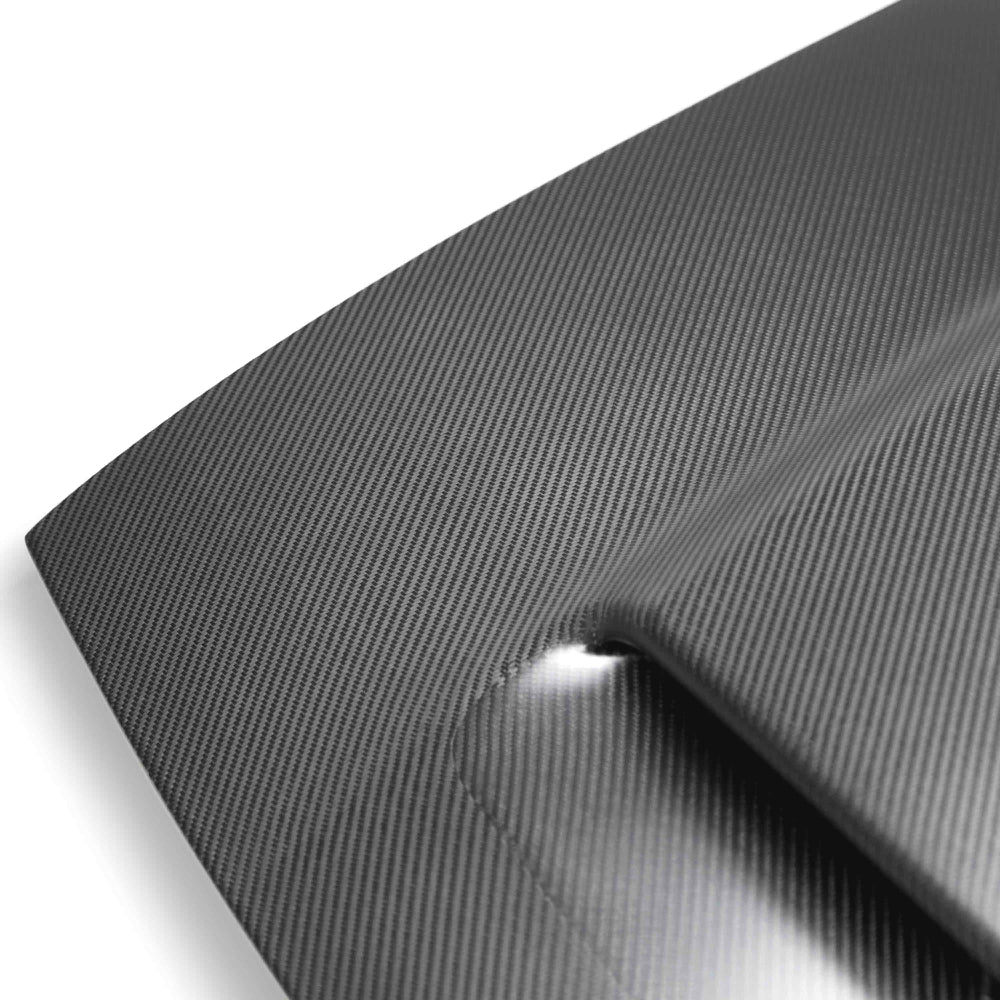 Close-up of 3K 2x2 twill pre-preg weave and precision surface finish.