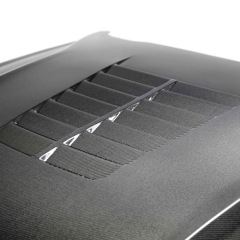 Close-up of louvered vent detail and polished UV-protected clear coat.