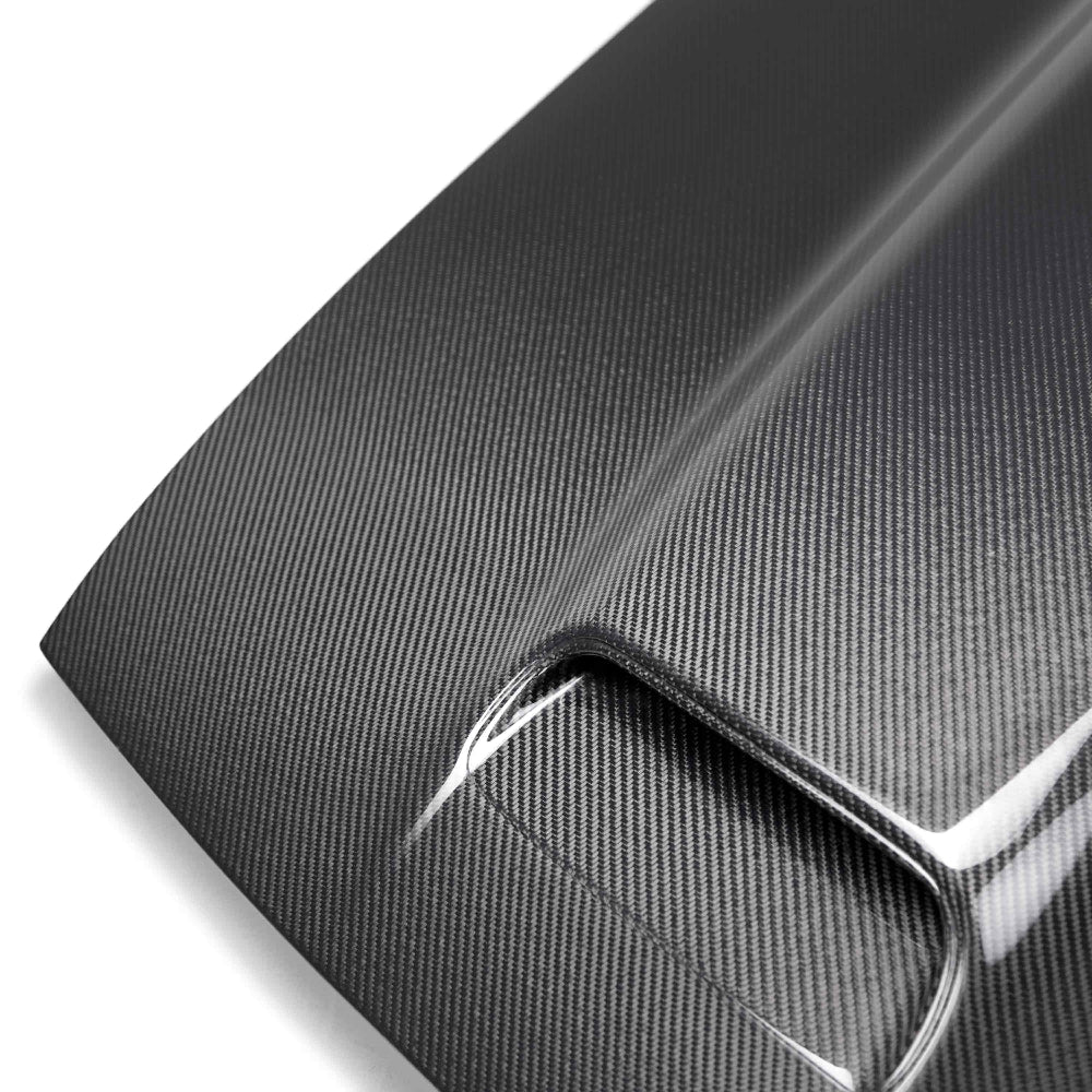 Close-up of functional air scoop and UV-gloss finish on Type-RE carbon fiber hood by Anderson Composites.
