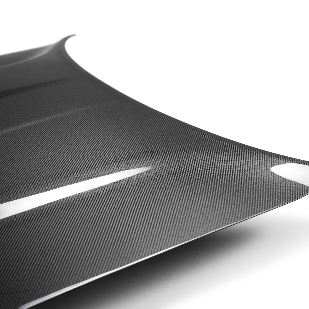 Underside view showing fiberglass inner skeleton bonded to carbon fiber outer layer for strength and rigidity.
