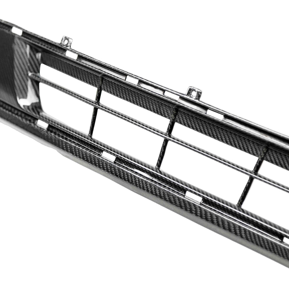 Rear perspective showing fitment tabs and OE-style mounting points for the Mustang carbon fiber grille